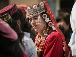 group of people with headdresses